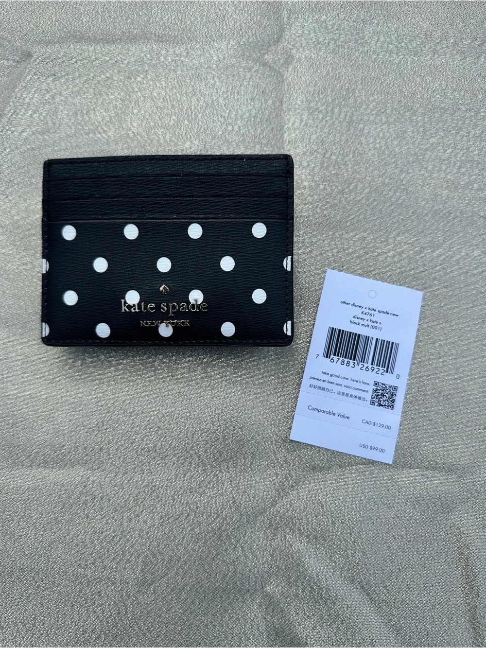 kate spade Black Polka Dot Card Case with Red Bow Accent